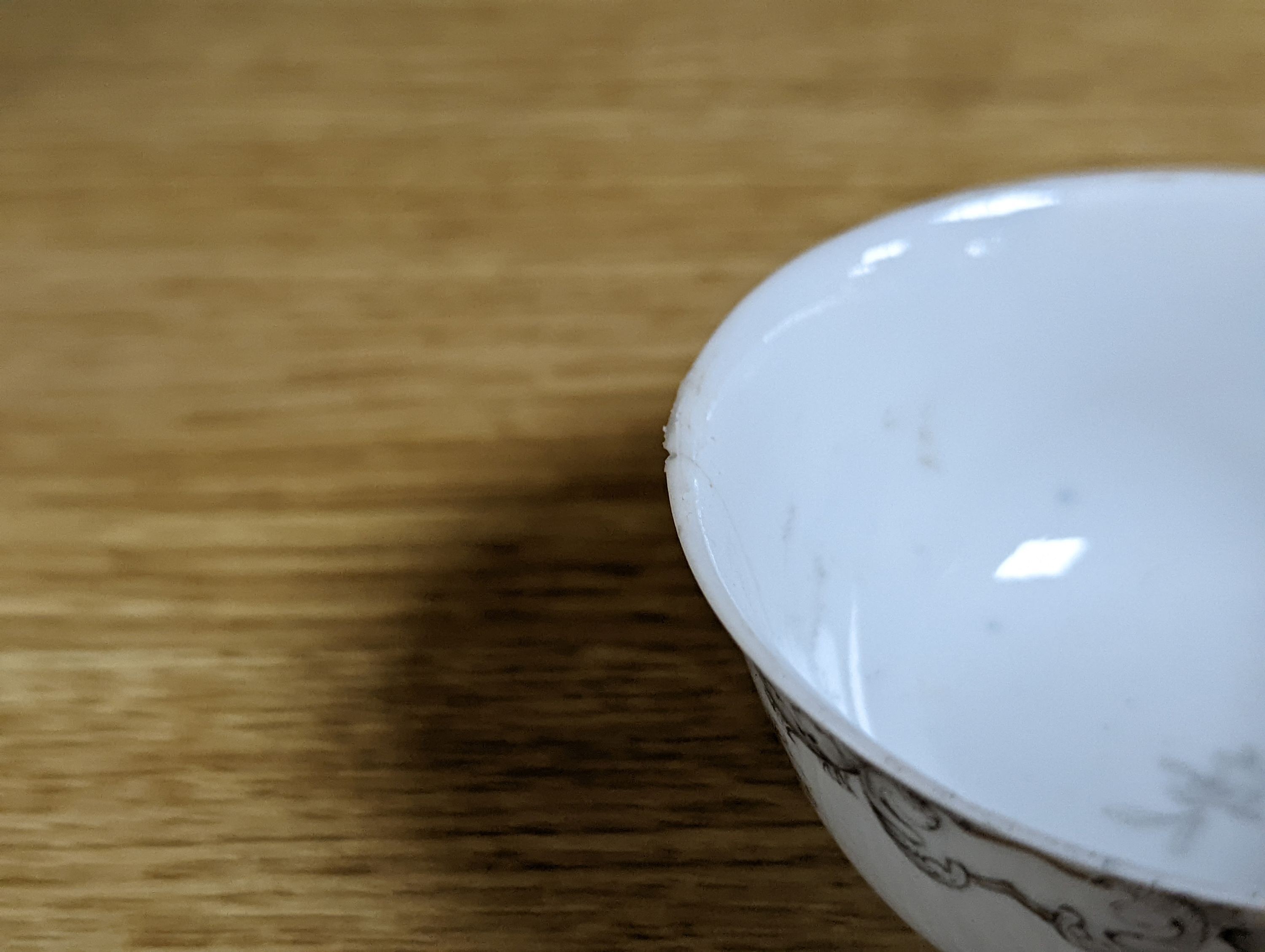 Two 18th century Chinese export bowls, a similar tea bowl and another Chinese blue and white tea bowl, largest 20cm diameter